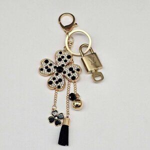 Authentic Louis Vuitton Lock & Key with unbranded Flower Bagcharm, Keycharm